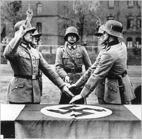 Members of a military unit swear allegiance to Hitler and the party
